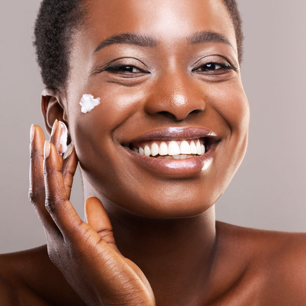 woman using skincare