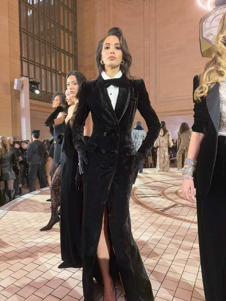 A women dressed all black in Fashion Show